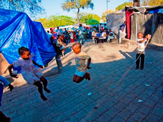 Illustration for article titled Haiti in Photos: A Year Later